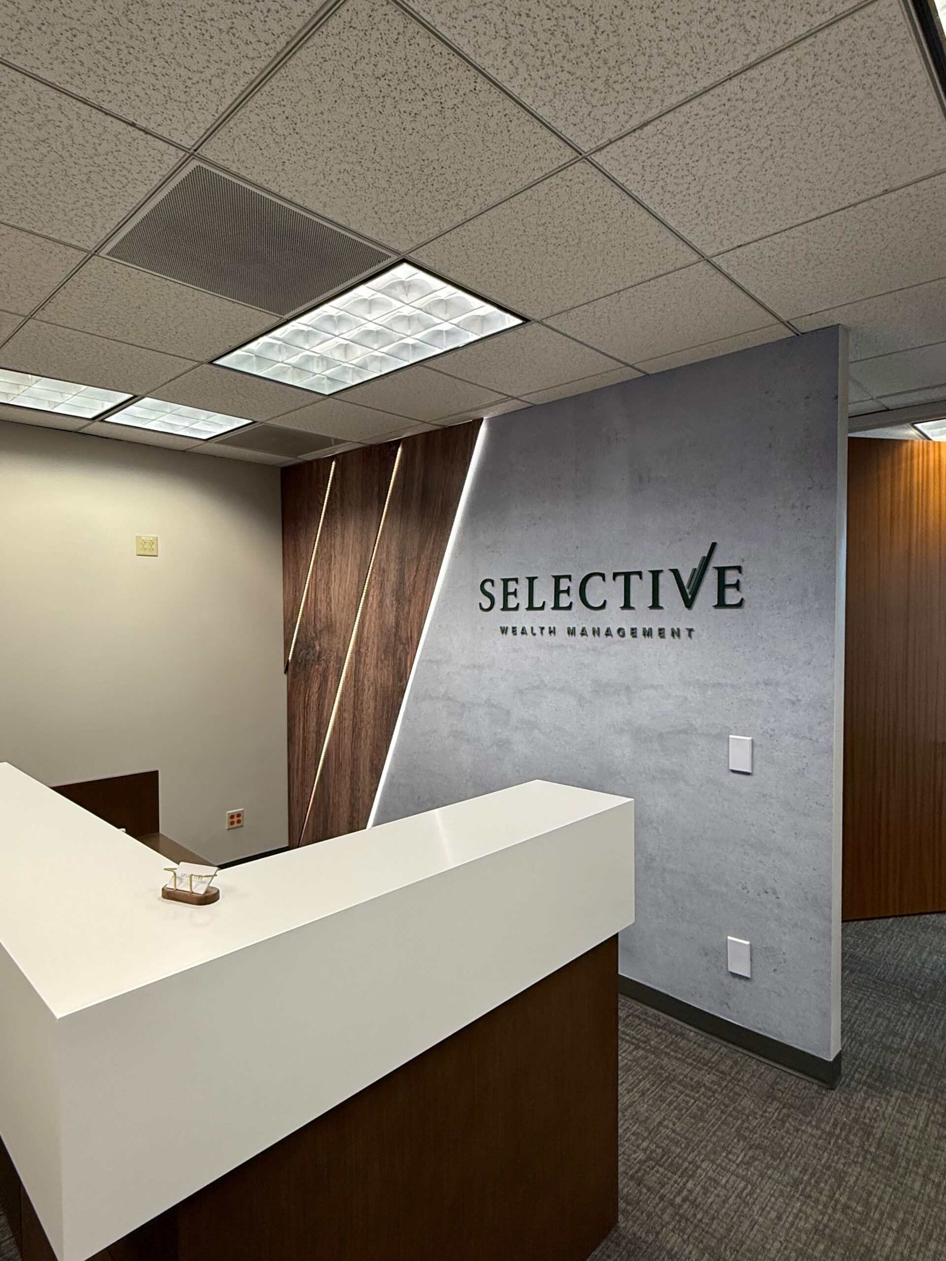 SmartSwans reception wall graphics and interior branding project
