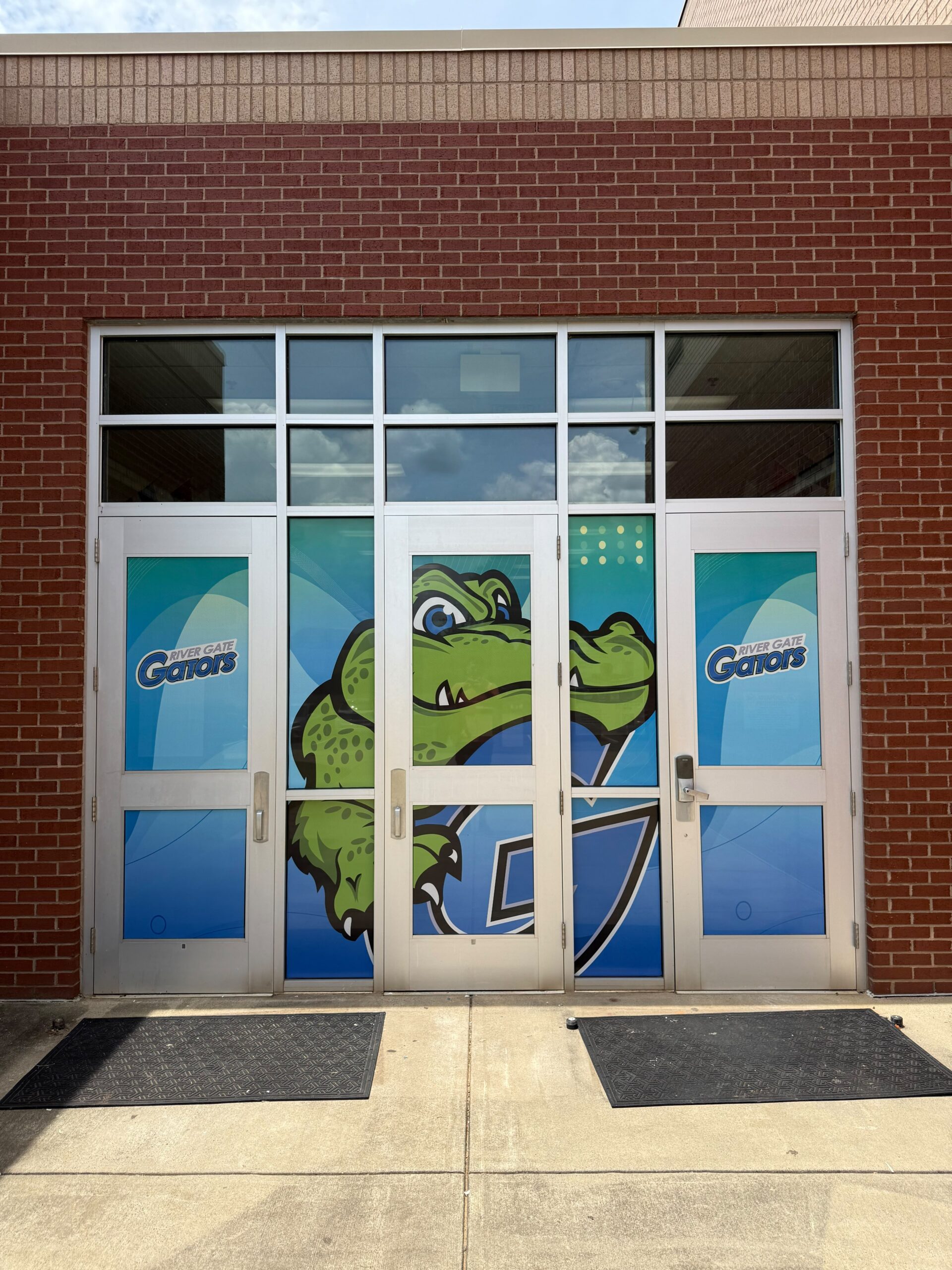 SmartSwans storefront window decals and glass branding project