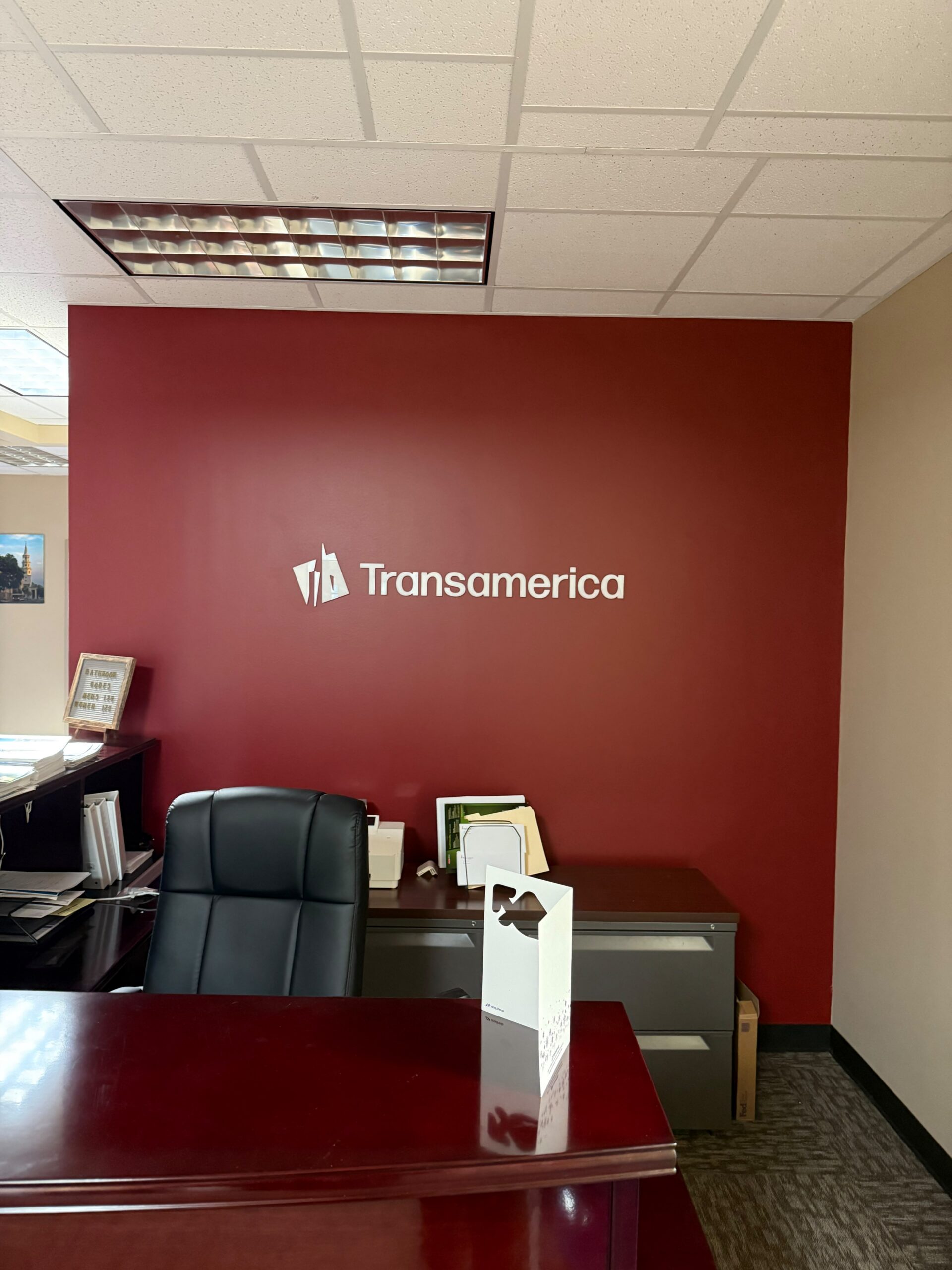 SmartSwans reception wall logo and interior brand sign project